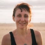 jennie f smiling at the beach